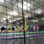 Dodge-ball is fun and safe with trampoline park netting.