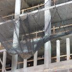 Safety netting catches falling debris.