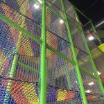 Colorful climb netting for trampoline parks