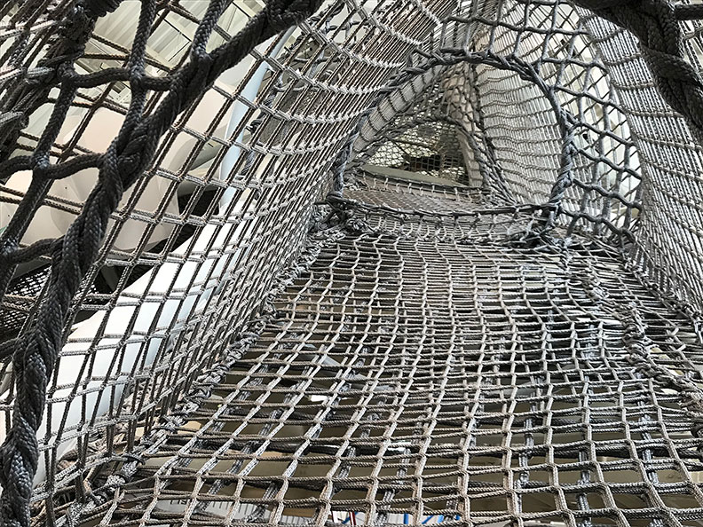 A tunnel made from climbing netting.