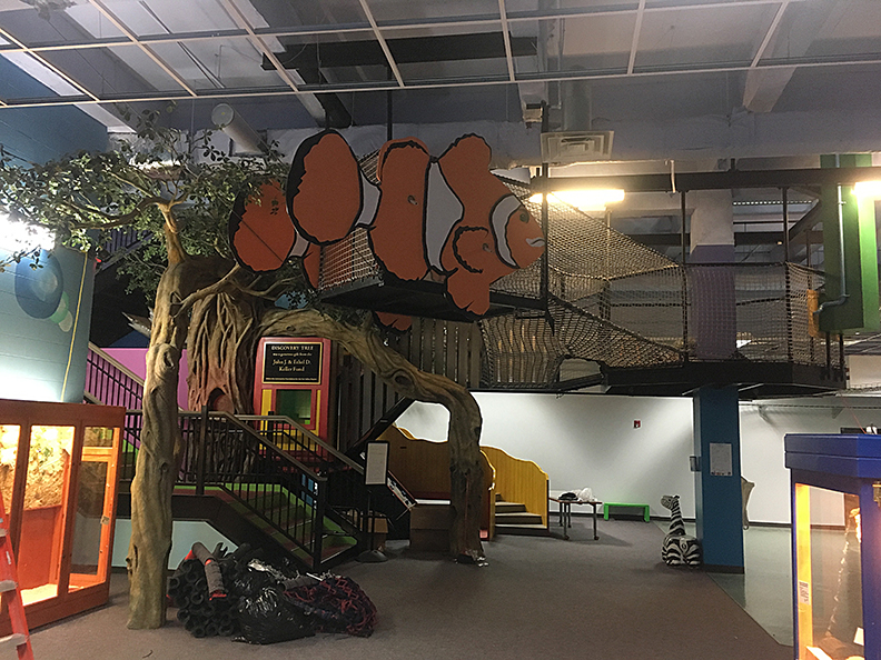 A climbing net structure in The Building for Kids