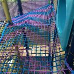 Purple and blue climb netting.