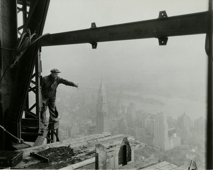 The Chrysler Building is seen in the distance from the Empire State Building, during it's construction.